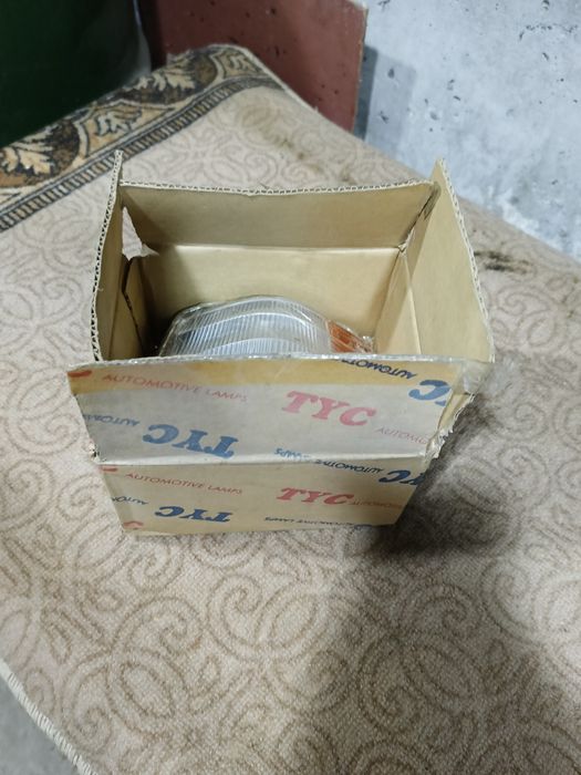 Поворотник Mazda 323