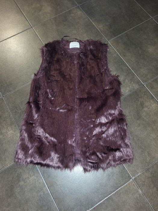 Vesta de blana dama