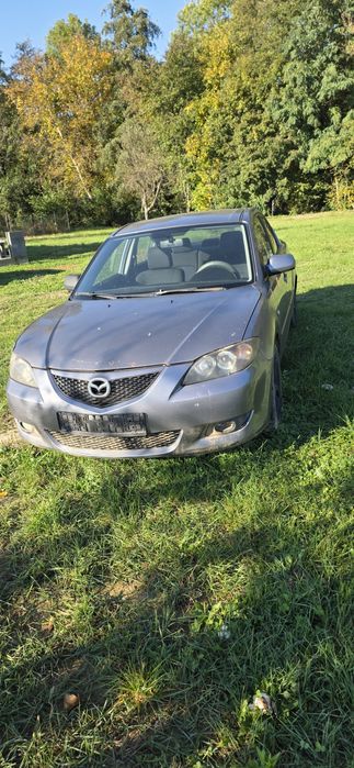 Mazda 3 An 2004.