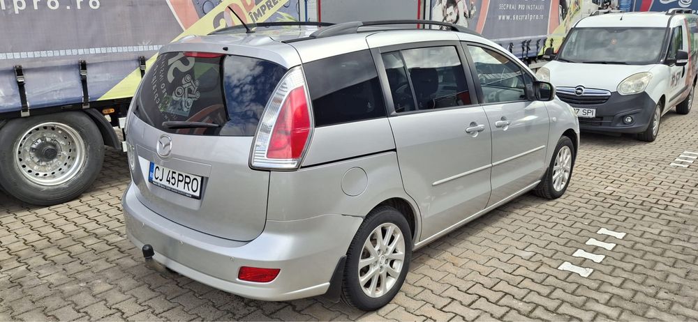 Vand MAZDA 5 din 2009 cu 7 locuri.