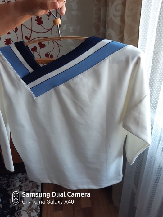 Продам свитер новый