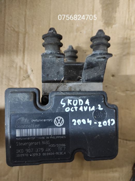 Pompa abs unitate abs Skoda 1K0907379AK