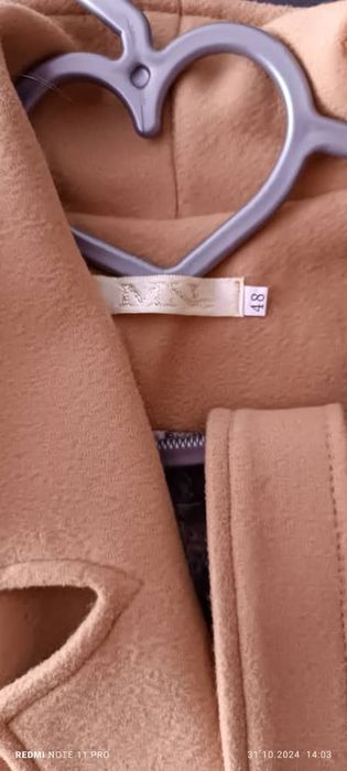 Пальто новое 48 размера