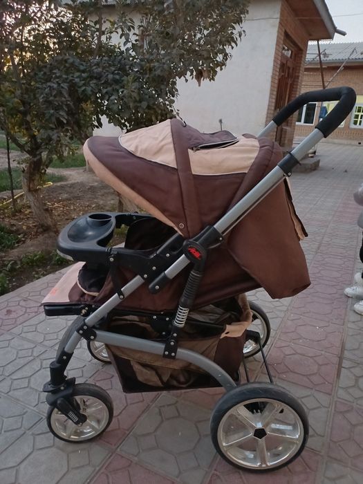 Коляска холати ало.