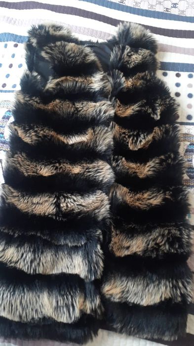 Продаётся жилетка пуховая 8 тыс