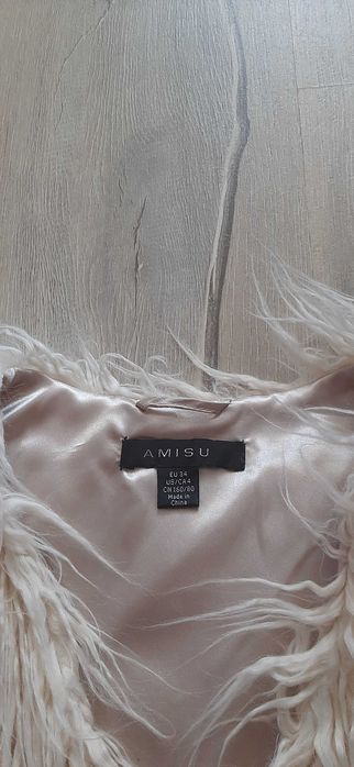 Дамски елек пухен