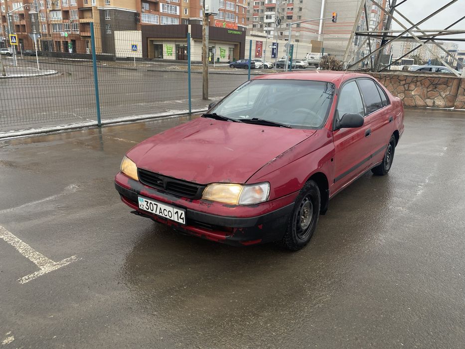 Тойота Carina e