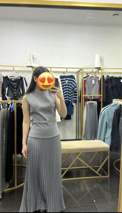 Двойка с плисированным юбком