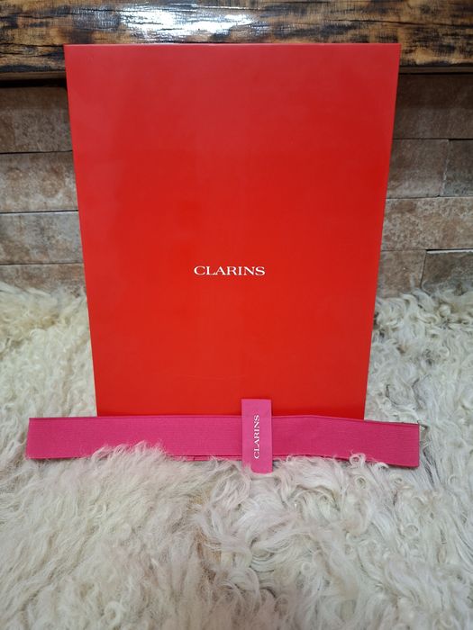 Cutie originală pentru calendar advent Clarins cu 12 cutiuțe