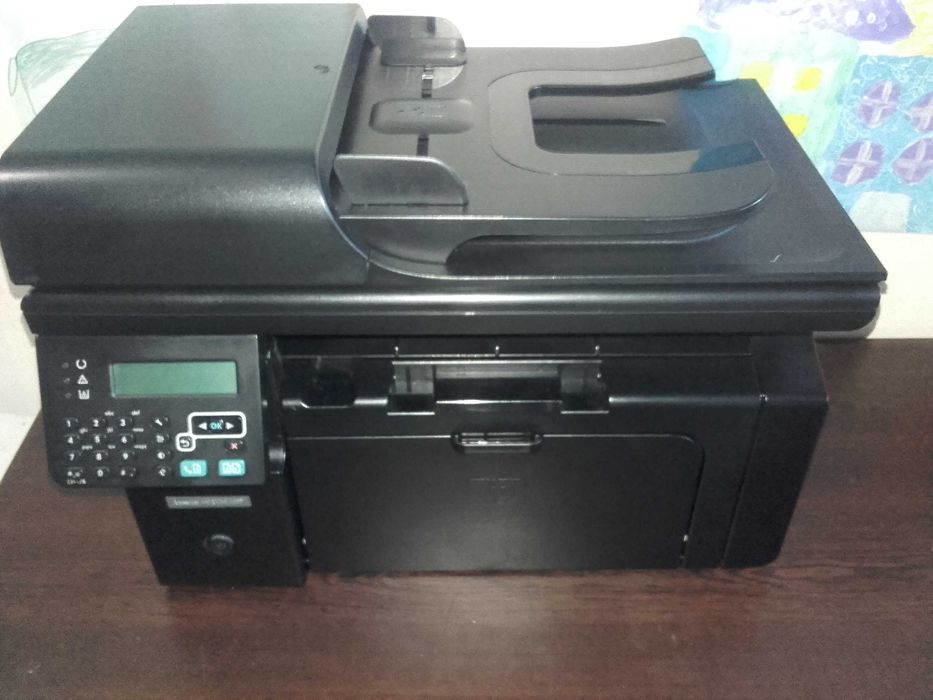 Отличен! Лазерен принтер, скенер и копир 3 в 1 HP LaserJet M1212nf MFP