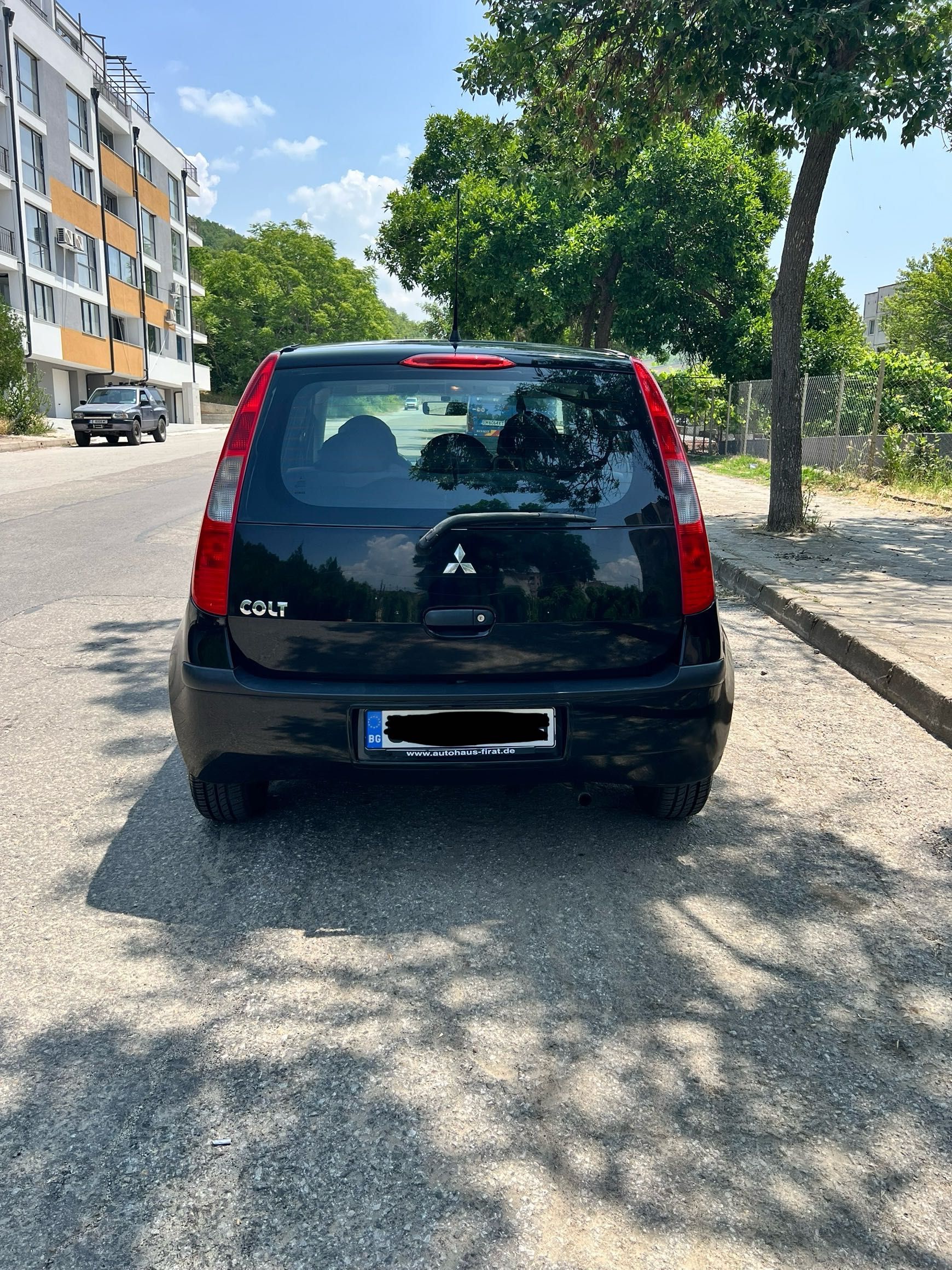 Mitsubishi Colt бензин 1.1 12V 2004 г.