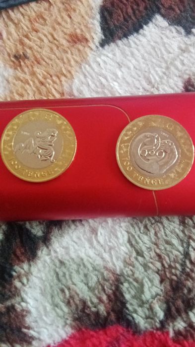 Продам манеты 100 тенге новые с изоброжением