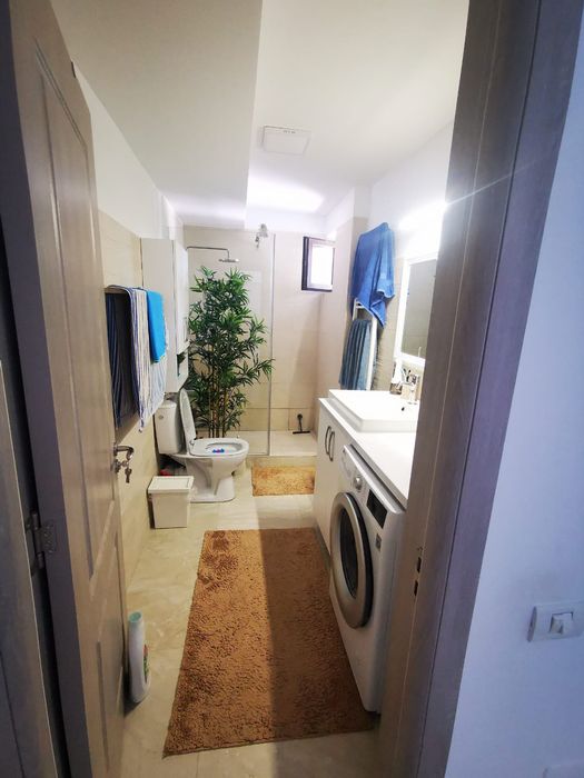 Casa Parter+Etaj+2 locuri de parcare+toate utilitatile situata central