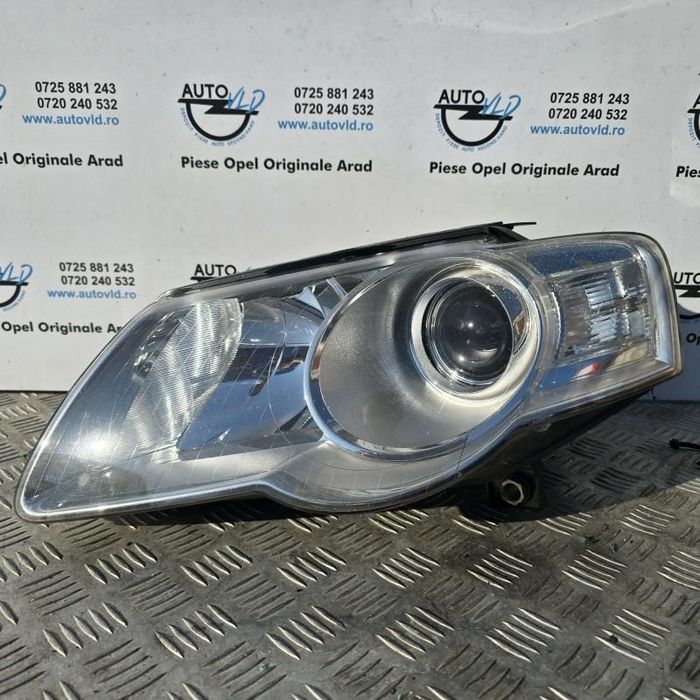 Far stanga cu lupa Volkswagen Passat B6 3C