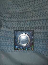 Сребърен пръстен с лилаво камъче