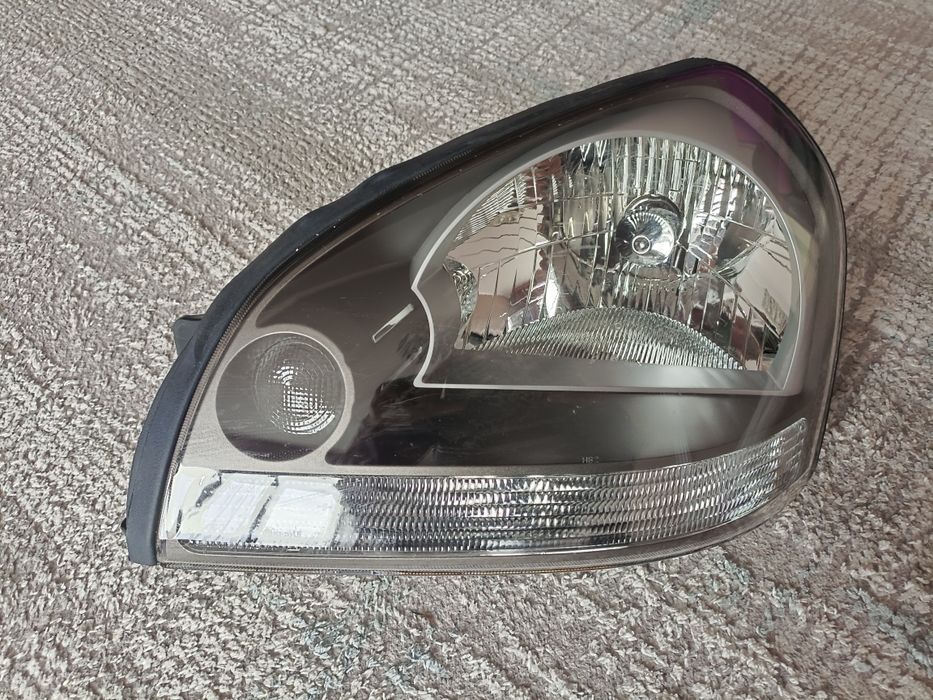 Продам левую фару Туксон JM