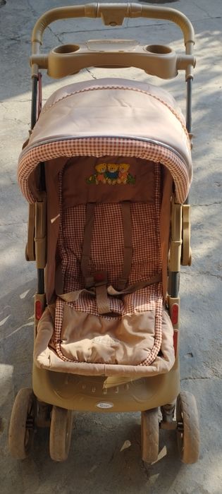 Детская коляска с перекидной ручкой