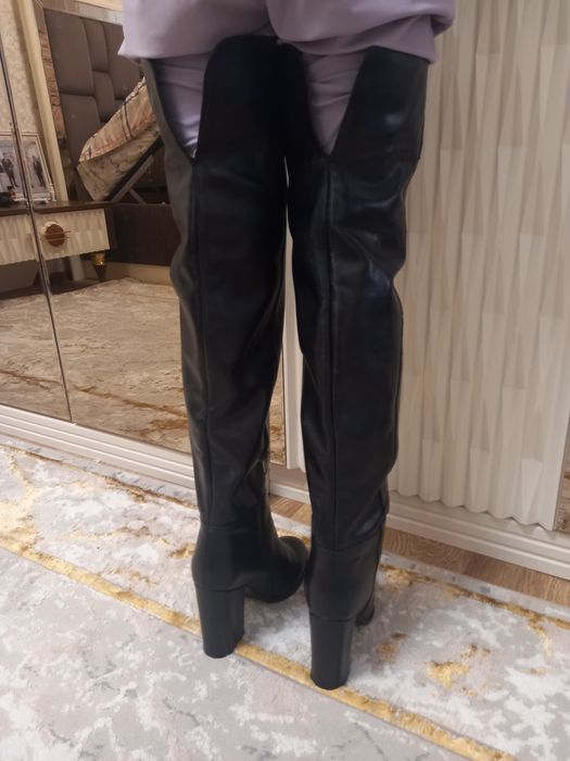 Продам зимние сапоги новые