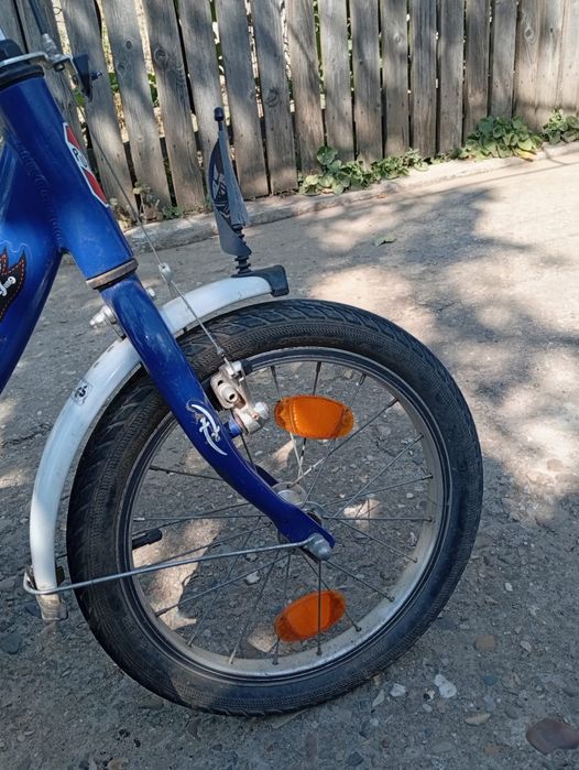 Bicicletă copii șapte-zece ani