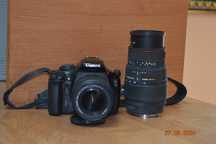 Зеркальный фотоаппарат Canon EOS 1100D с дополнительным объективом