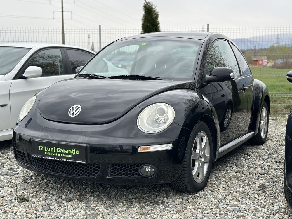 Vw new beetle 1.6i 2008 12 luni Garantie Rate