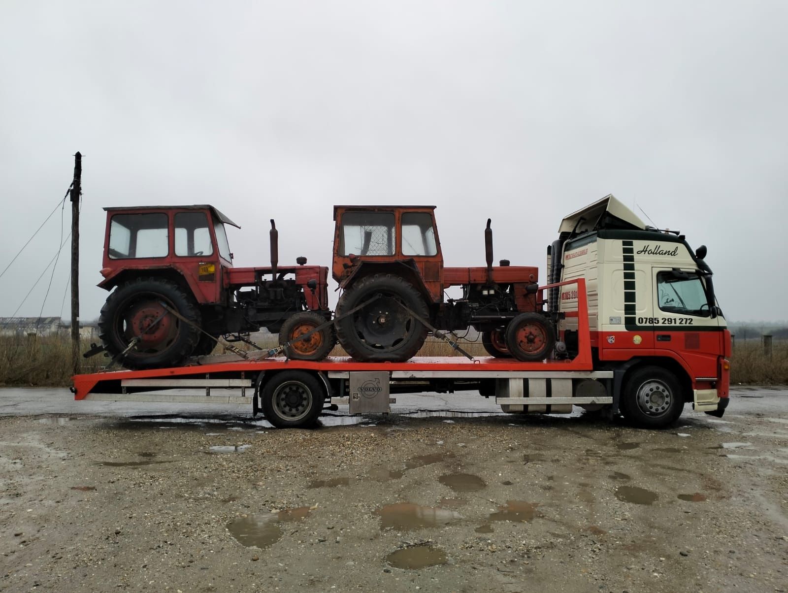 Transport utilaje ALEXANDRIA transport tractor combina Trailer telorma