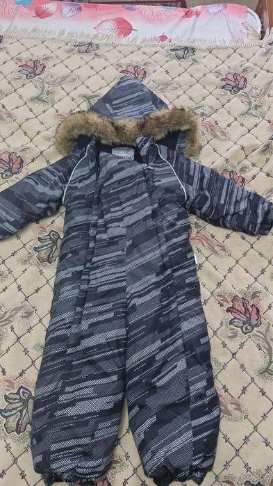 Продам зимний комбинезон Huppa