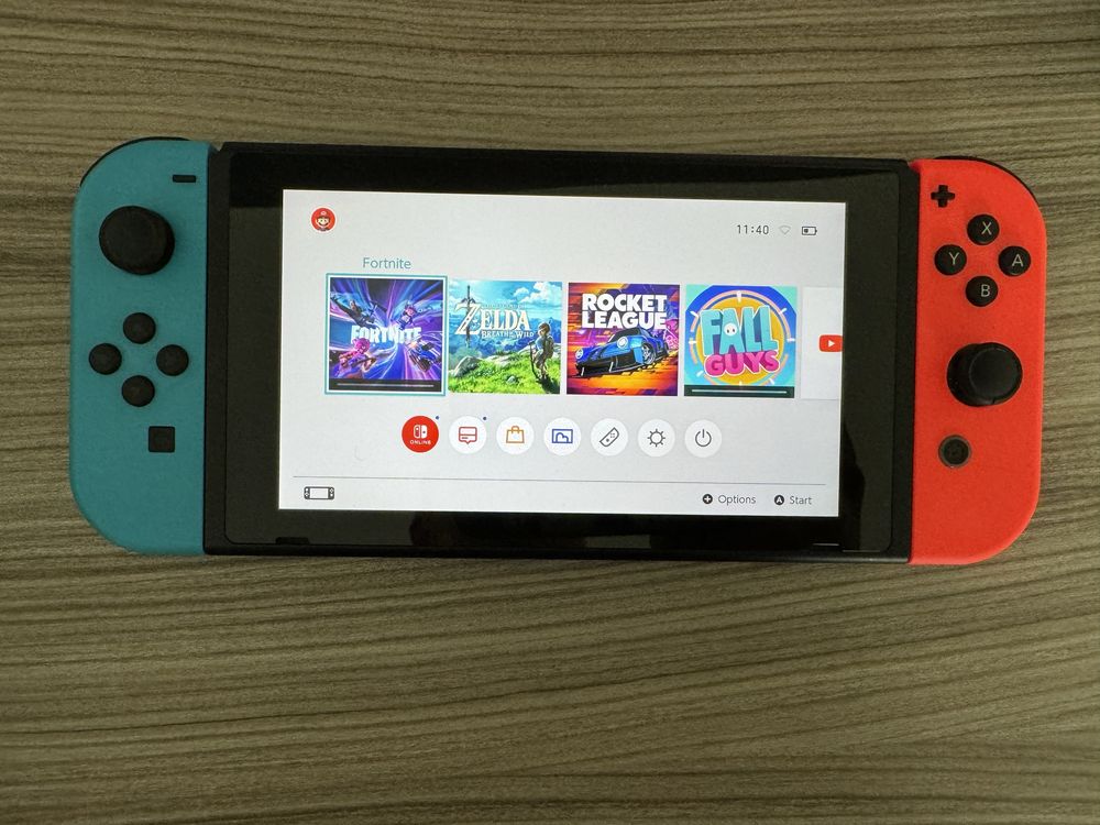 Consola NINTENDO Switch (Joy-Con Neon Red/Blue)+The legend of Zelda