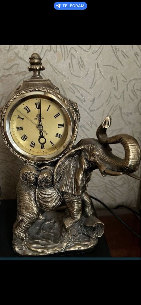 Часы с слоном