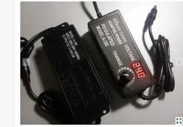 с большим дисплеем и настройкой напряжения - блок питания