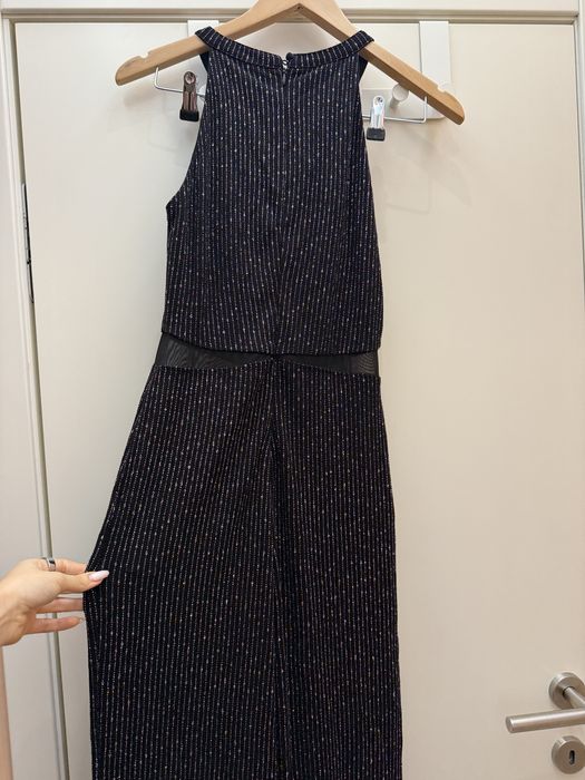 Блестящ гащеризон с прозрачни детайли и широки крачоли