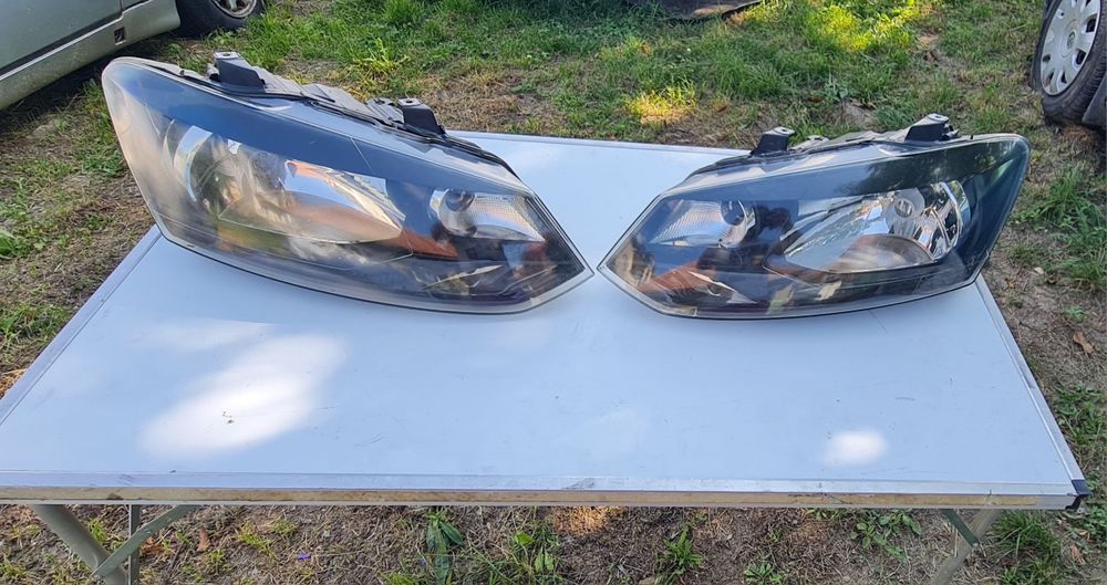 Set faruri originale vw Polo 2009-2014 dreapta/stanga Europa