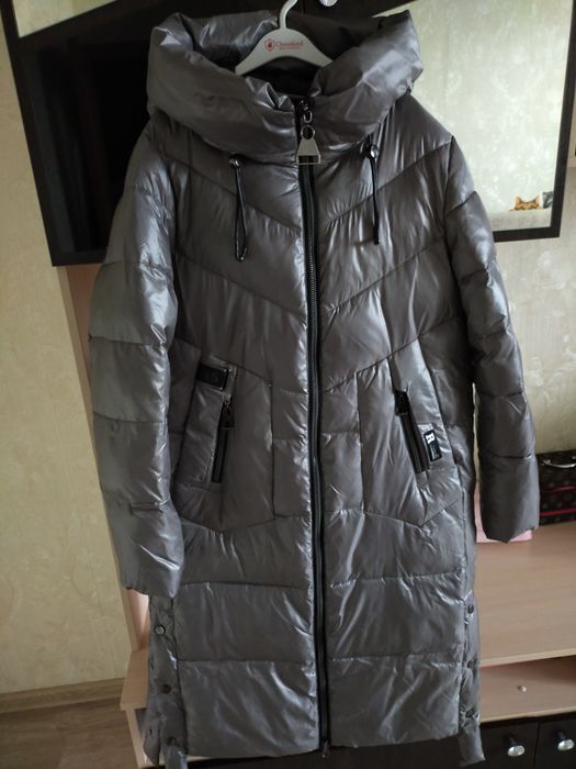 Женский пуховик .