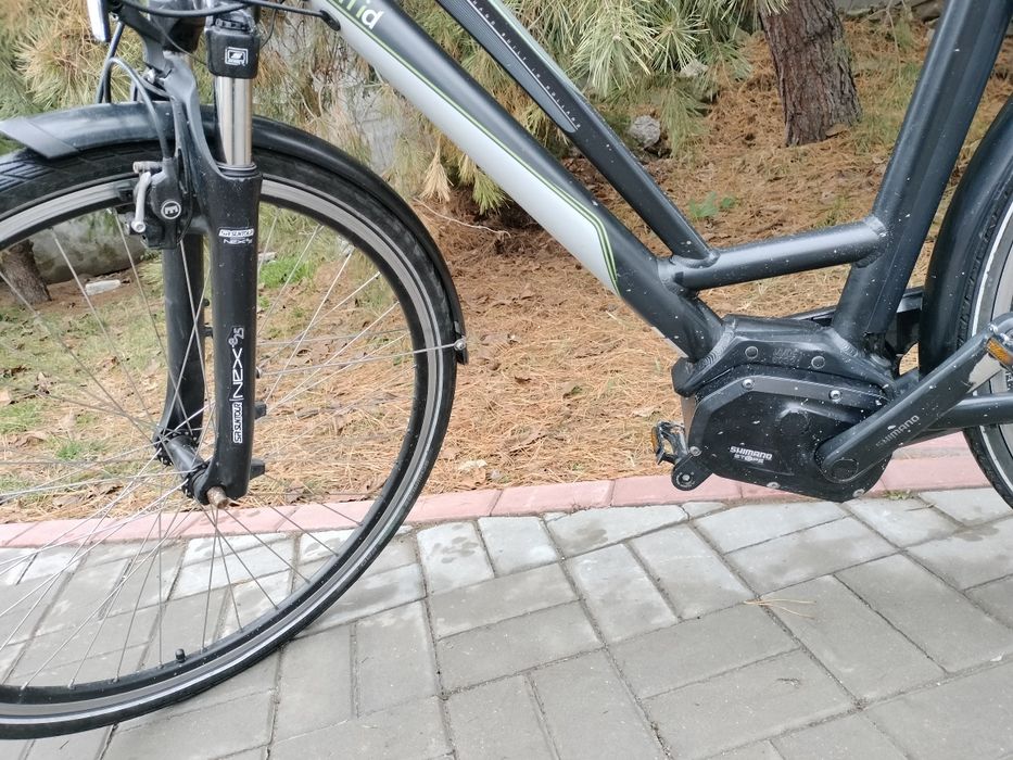 Bicicleta electrica Shimano, cu motor central.