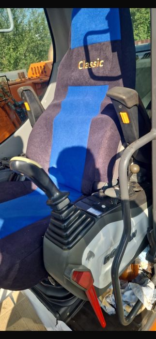 Excavator pe roti Doosan DX 140 W impecabil 2800 ore