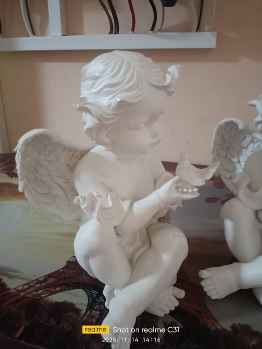 Vând 2 îngeri  noi