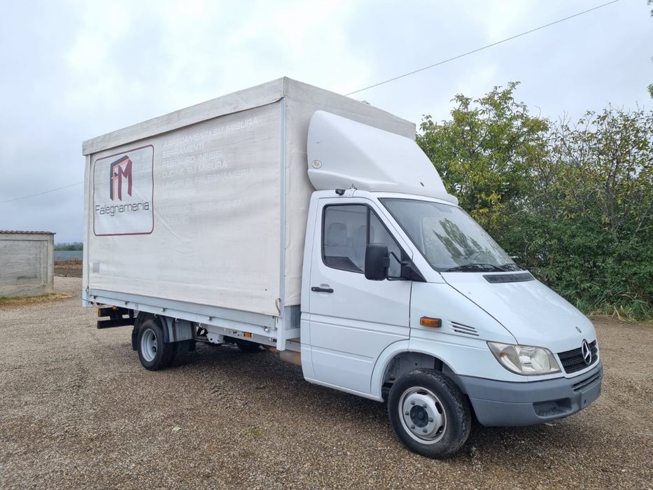 Mercedes sprinter 416 cu bena ficsa cu prelata care se inalta .