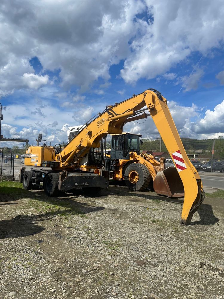Excavator pe pneuri Liebherr A316 cu graifer – Leasing disponibil