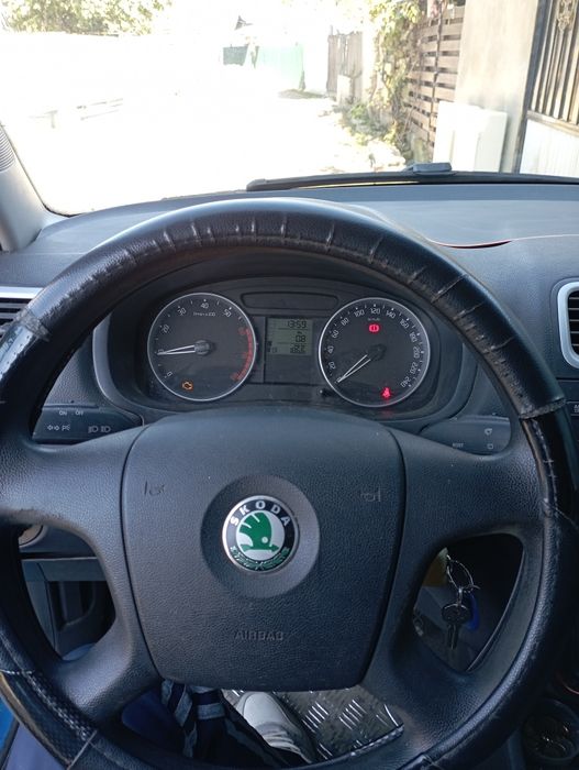 skoda roomster 1.2 benzina an 2009