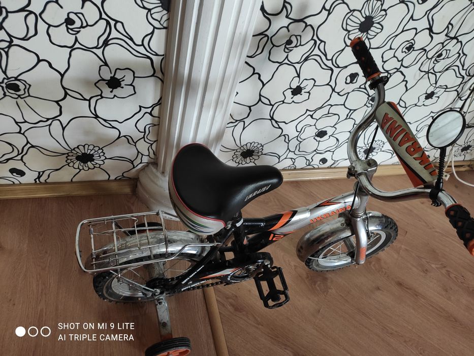 Продам велосипед с дополнительными колёсами