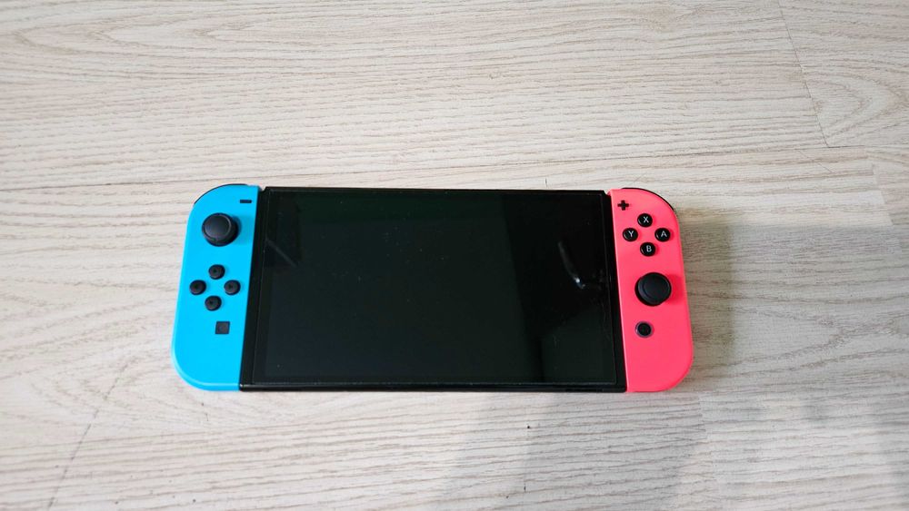 Nintendo Switch OLED + Ring Fit Adventure