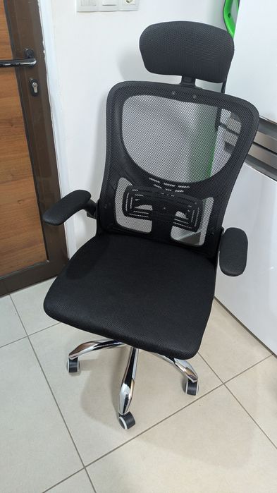 Scaun ergonomic folosit o zi