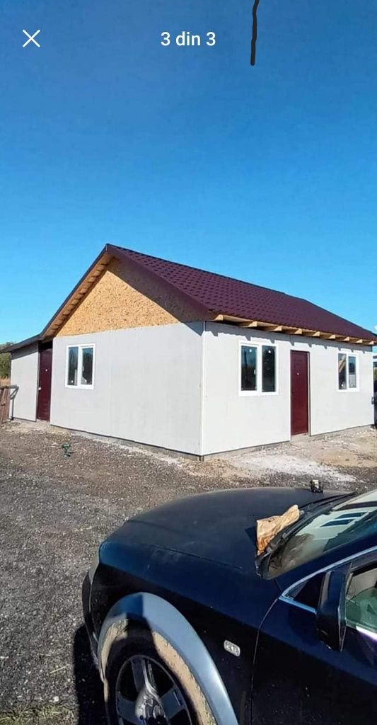 Casa modulara pe structură metalică rezistentă și invelita cu panou sa