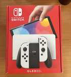 Nimtendo Switch Oled alb + Card Sandisk 256GB+4 joystick uri