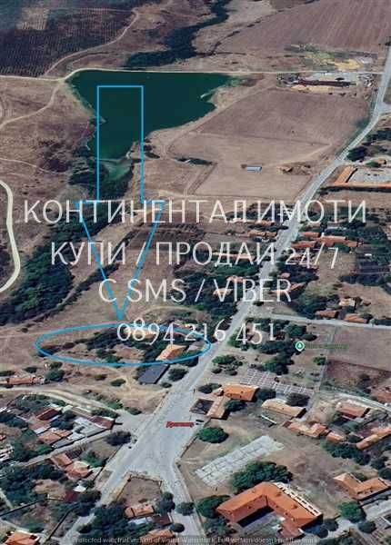 код 63001. Парцел 3800м2 в центъра на селото с лице на главната улица