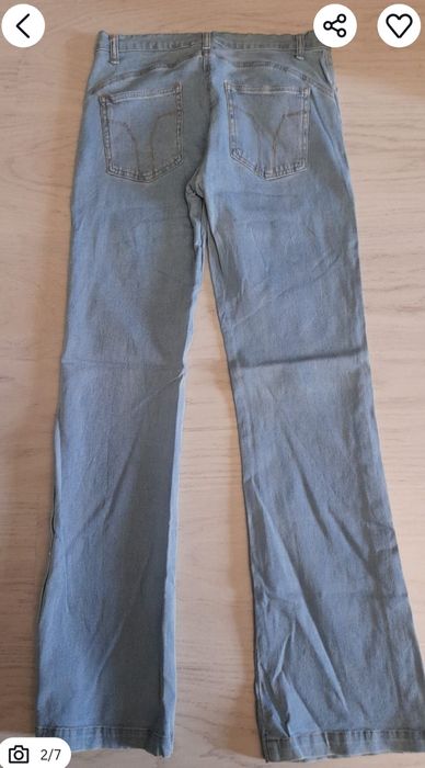 Blugi elastici cu capse