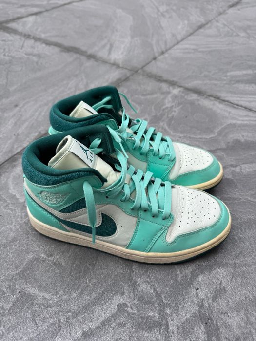 Air Jordan 1 Mid SE "Bleached Turquoise" sneakers.