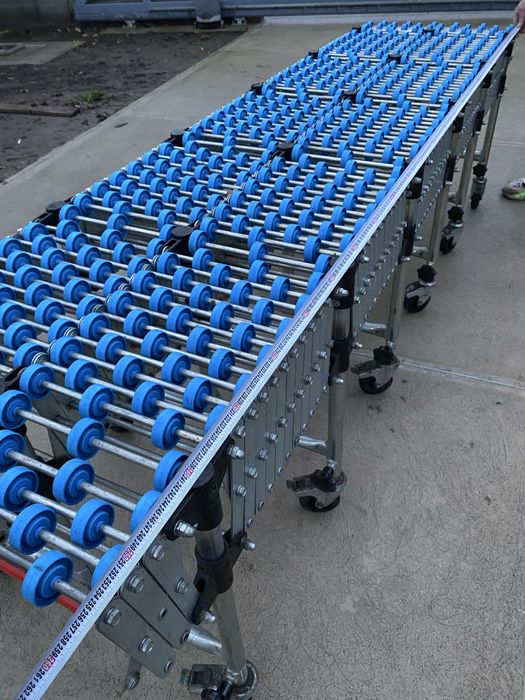 Banda transportoare , cale cu role mici flexibila Gura