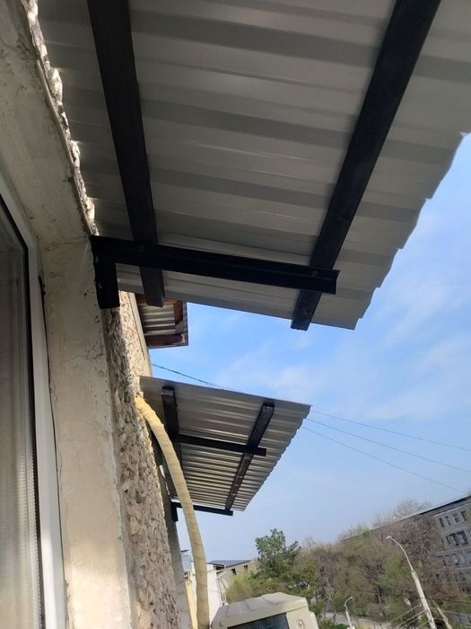 Установка бесшумного козырька, мойка фасада высотные работы, альпинист