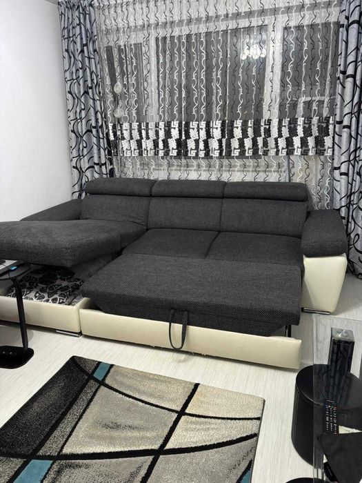 Canapea extensibila + spațiu depozitate